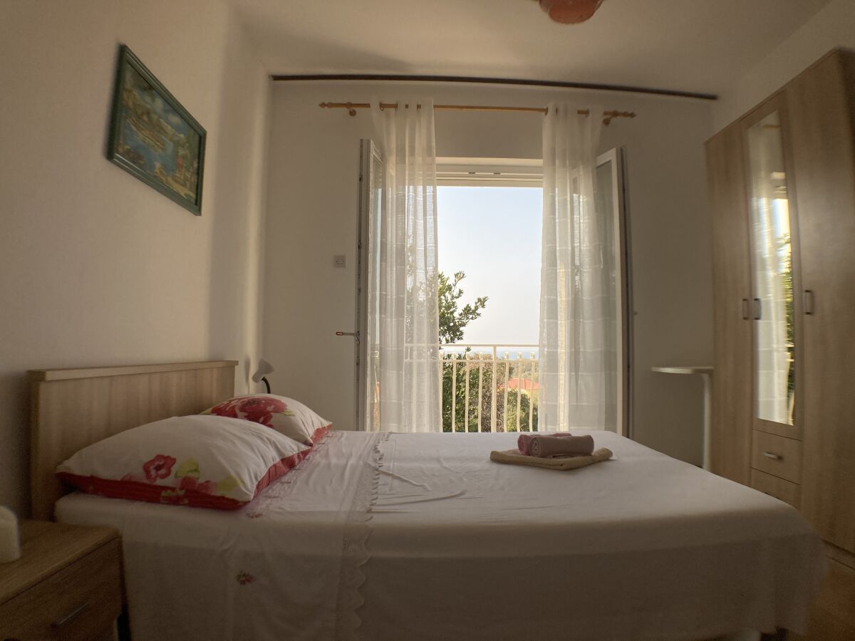 Apartment Two bedroom apartment with balcony and sea view Lun, Pag A-9395-b