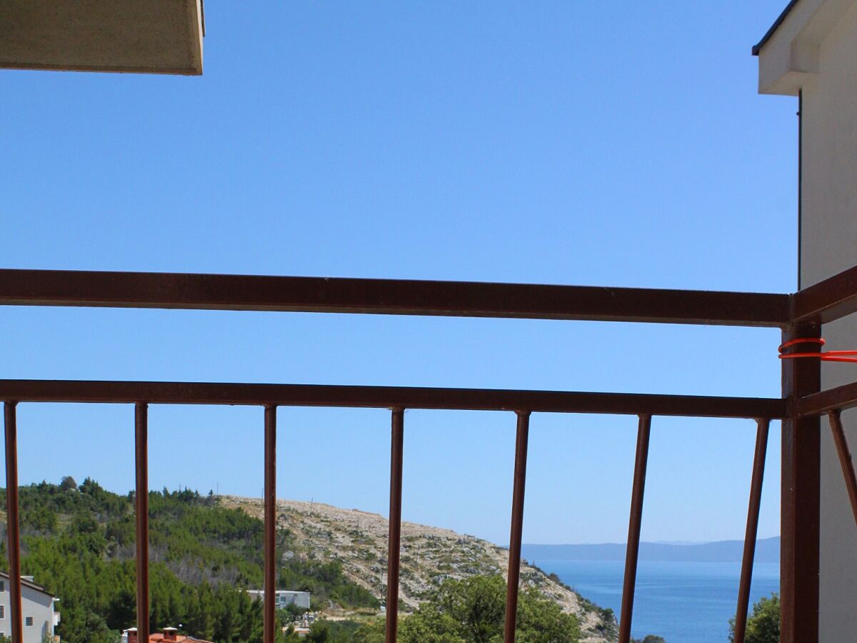 Apartment Three bedroom apartment with terrace and sea view Krvavica, Makarska A-6749-a