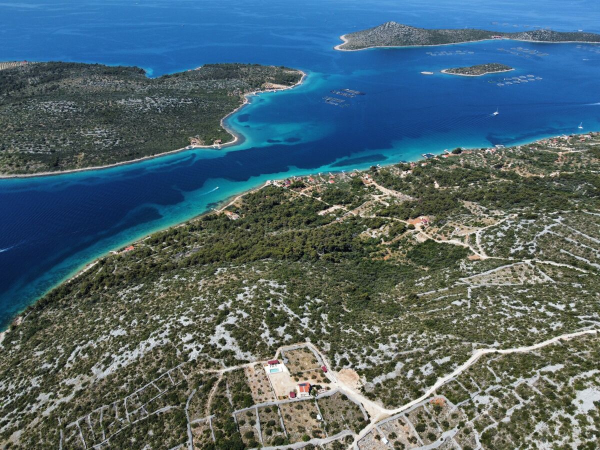 Holiday house Two bedroom house with terrace and sea view Cove Triluke, Pašman K-13577
