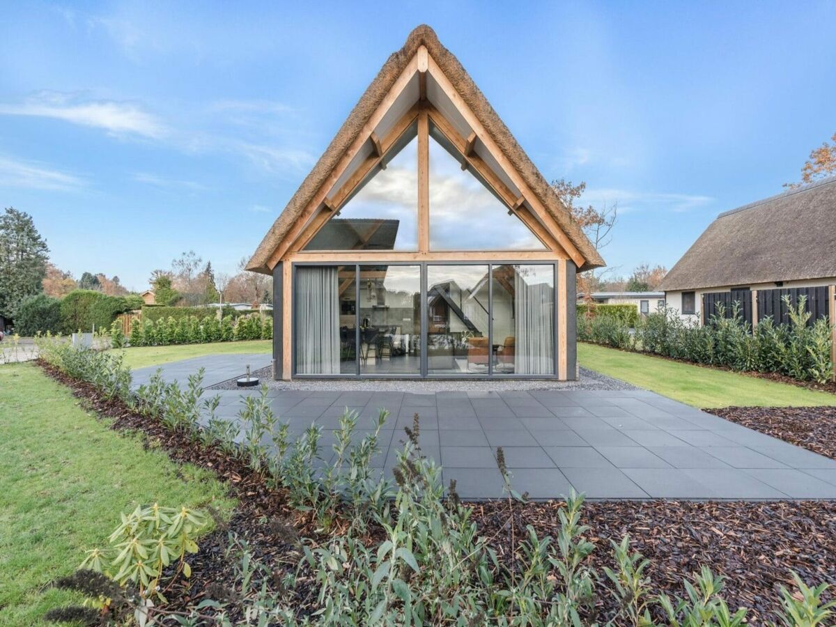 Holiday park Modern bungalow in Baarle-Nassau with pond view