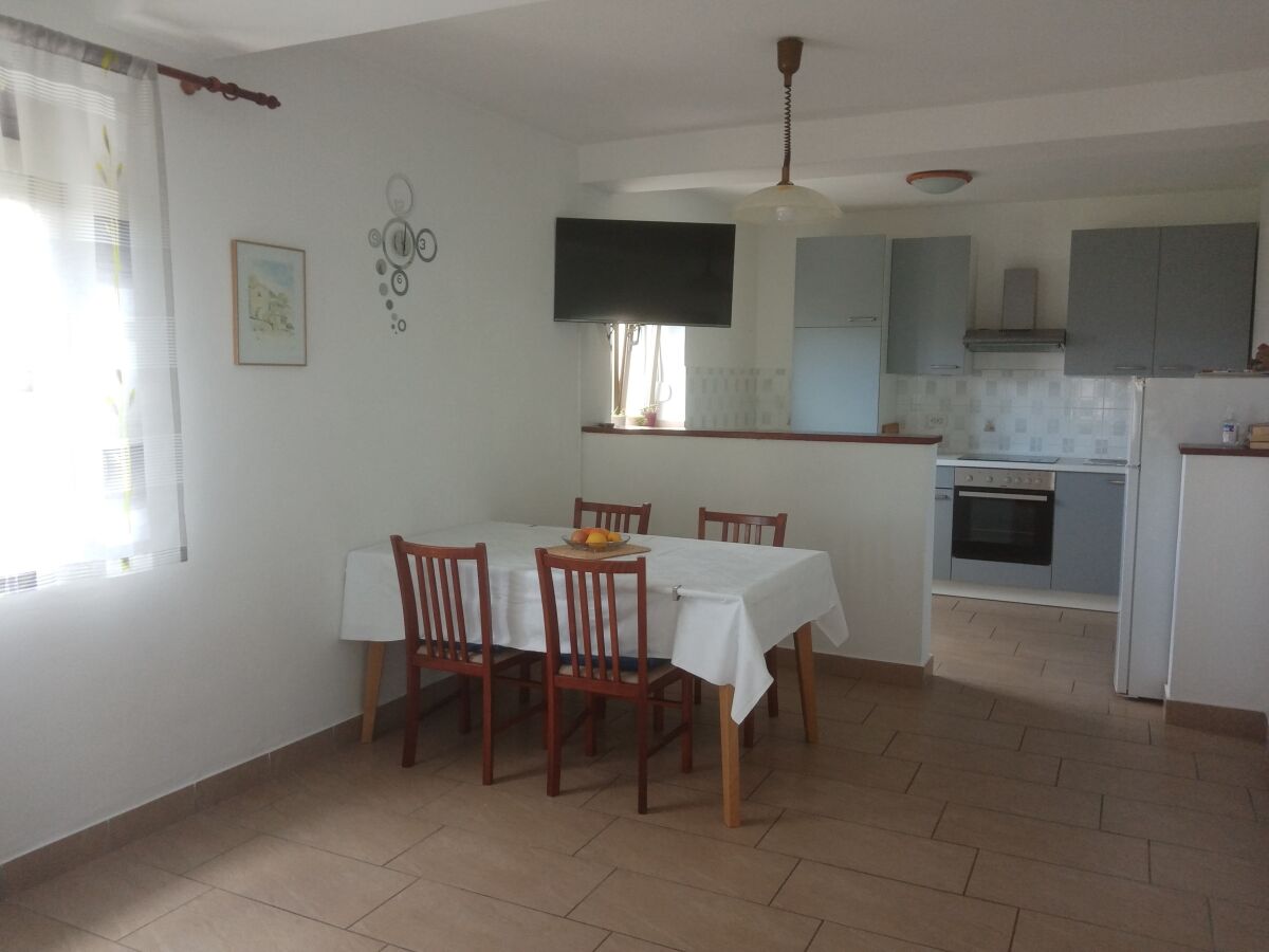 Apartment Two bedroom apartment with terrace and sea view Lopar, Rab A-17103-a - Outdoor photo 5