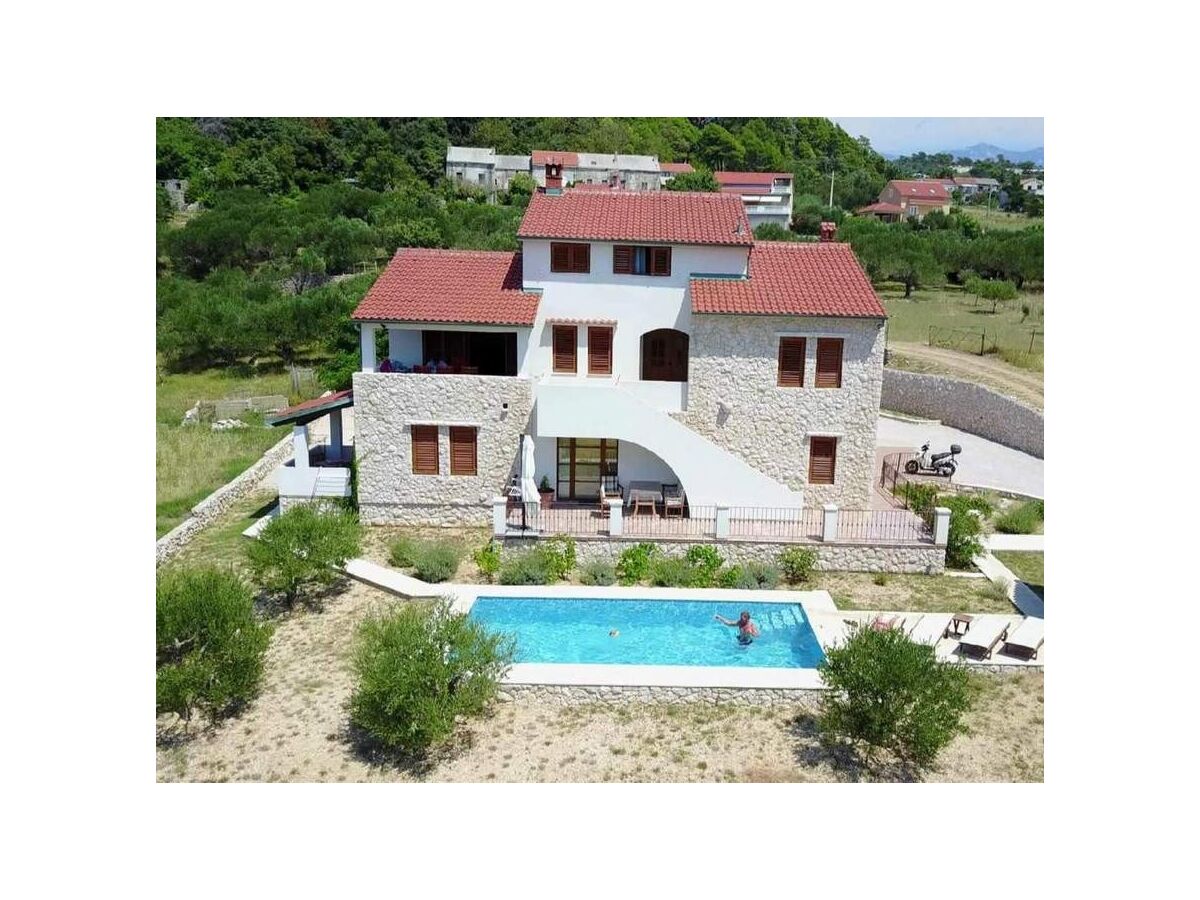 Apartment Two bedroom apartment with terrace and sea view Barbat, Rab A-22358-a - Outdoor photo 2