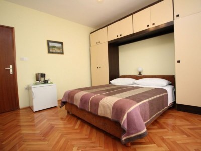 Holiday room with balcony Punat, Krk S-24848-a in Punat - Holiday room