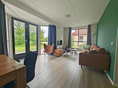 Holiday house Bungalow mit Terrasse und Seeblick - Features photo 3