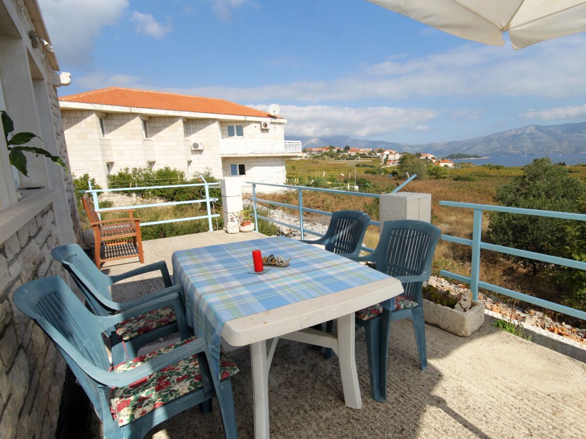 Apartment Two bedroom apartment with terrace and sea view Lumbarda, Korčula A-4376-a