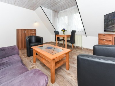 Apartment Gemütliche Ferienwohnung mit Balkon - Features photo 18