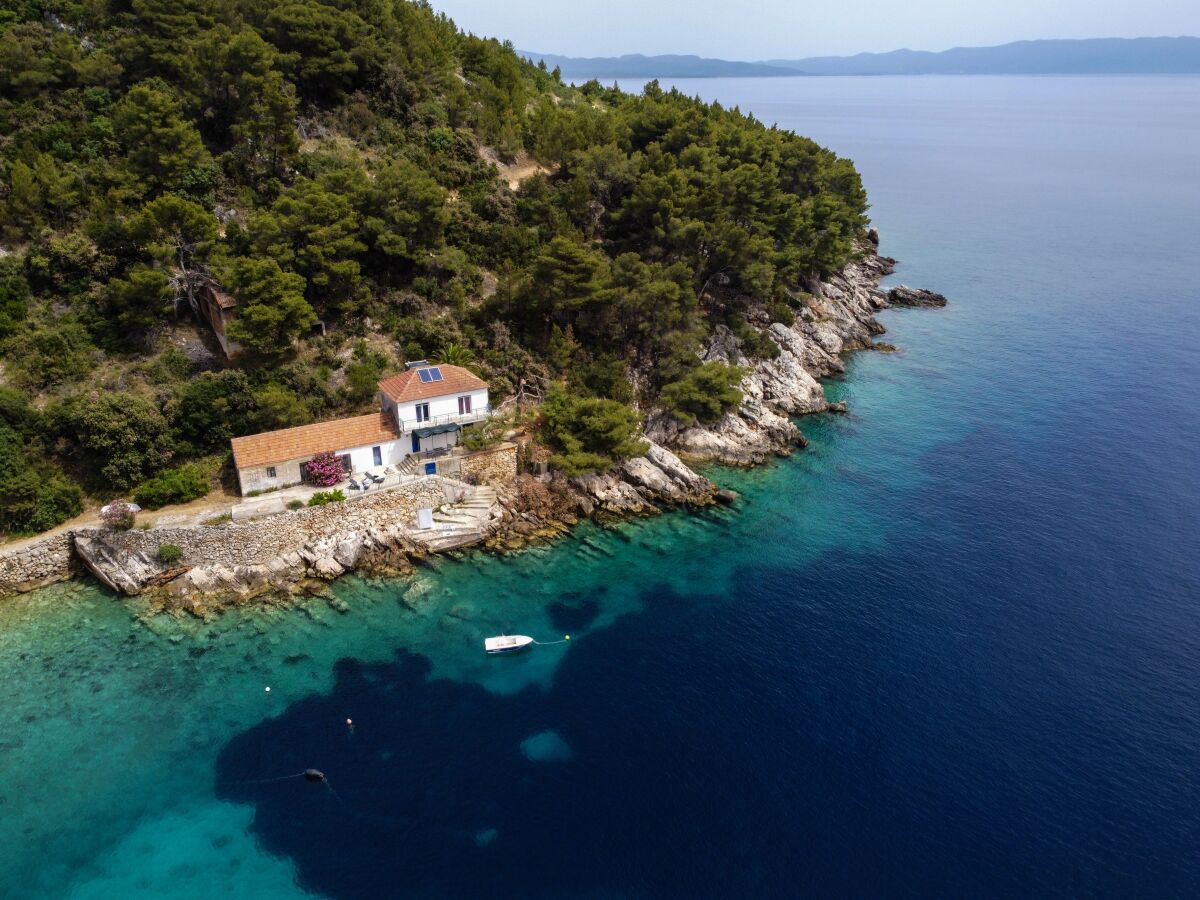 Holiday house Four-bedroom house near beach Cove Skozanje, Hvar K-4009