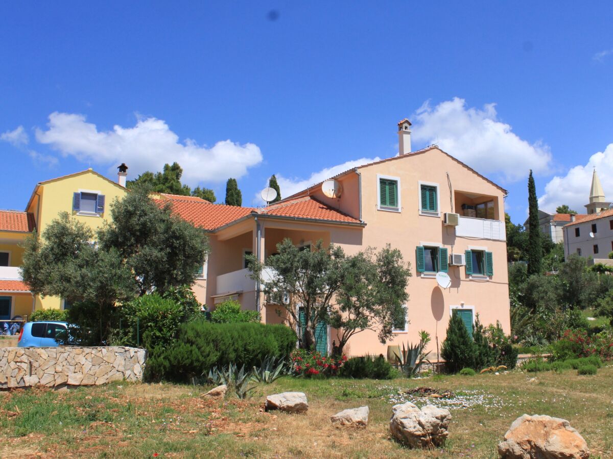 Apartment One bedroom apartment with terrace and sea view Sveti Jakov, Lošinj A-8011-a