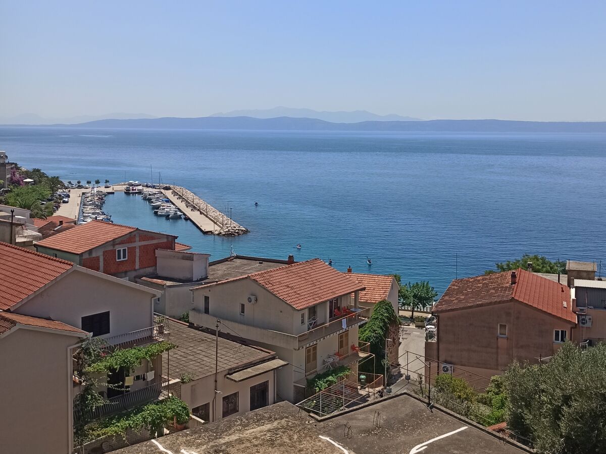 Apartment One bedroom apartment with terrace and sea view Podgora, Makarska A-2593-c