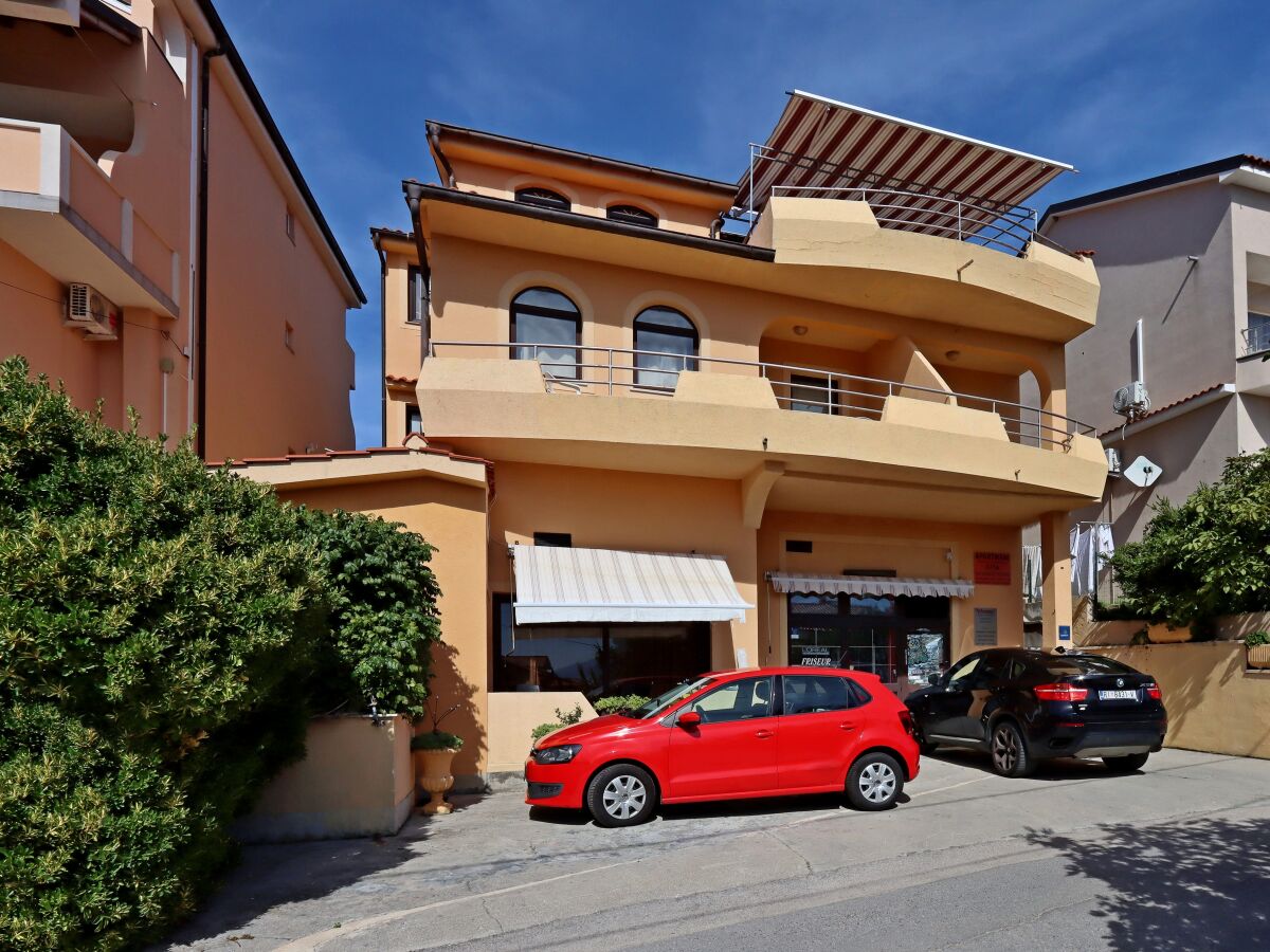 Apartment Two bedroom apartment with balcony and sea view Lopar, Rab A-21808-b