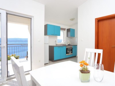 Apartment Two bedroom apartment with terrace and sea view Stanići, Omiš A-17894-a in Stanici - Apartment