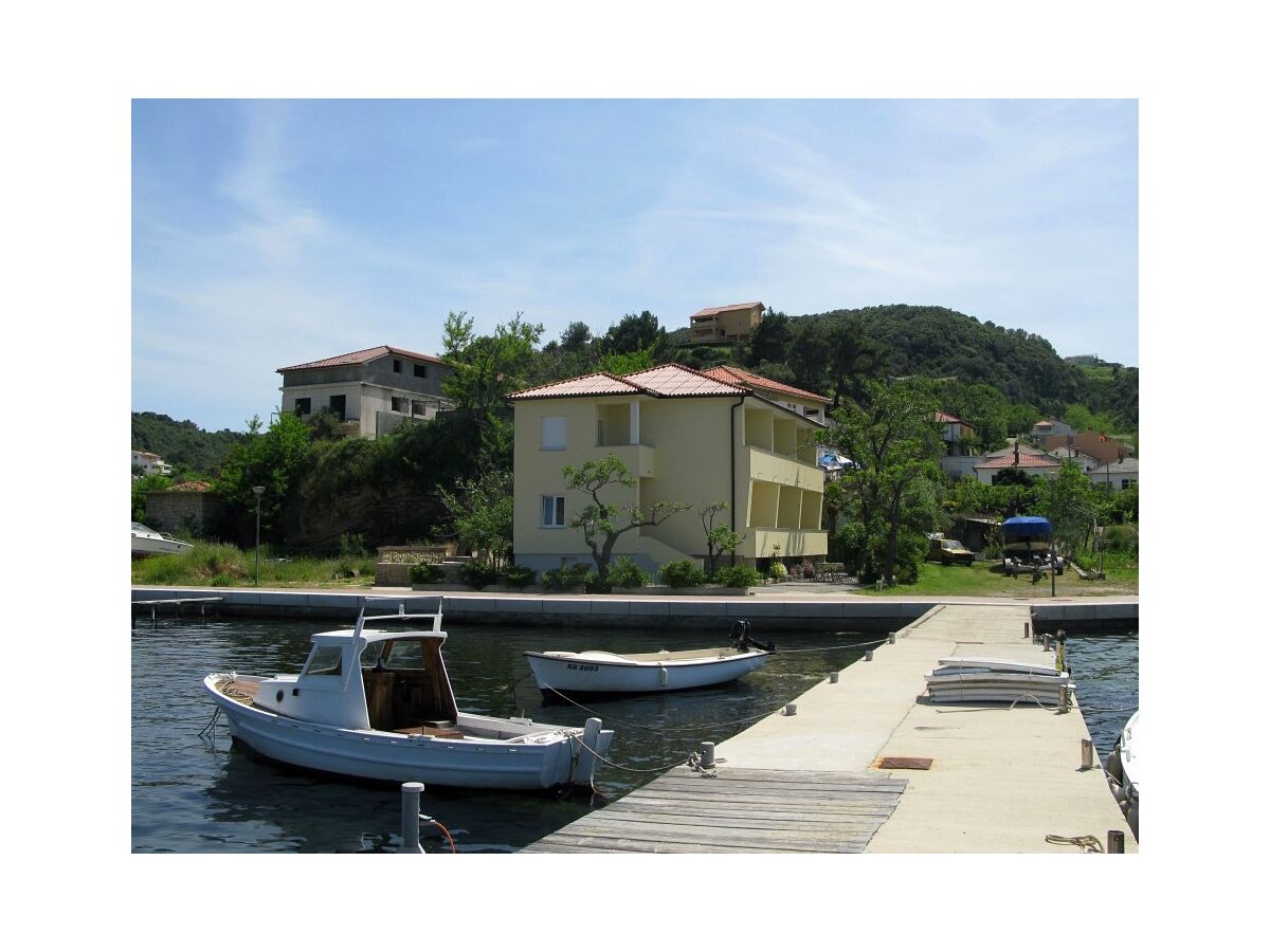 Apartment Two bedroom apartment with terrace and sea view Supetarska Draga - Donja, Rab A-11769-e