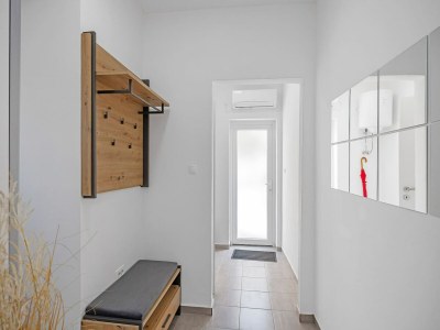 Apartment Wohnung mit Gemeinschaftsgarten in Banjol - Features photo 18
