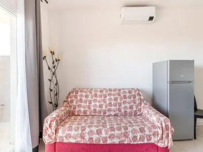 Apartment Air-conditioned, in residence, with pool and patio - Features photo 15