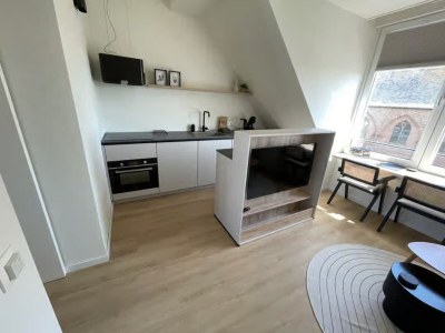Apartment 2-person lodge on 2nd floor with view of dunes. - Features photo 6