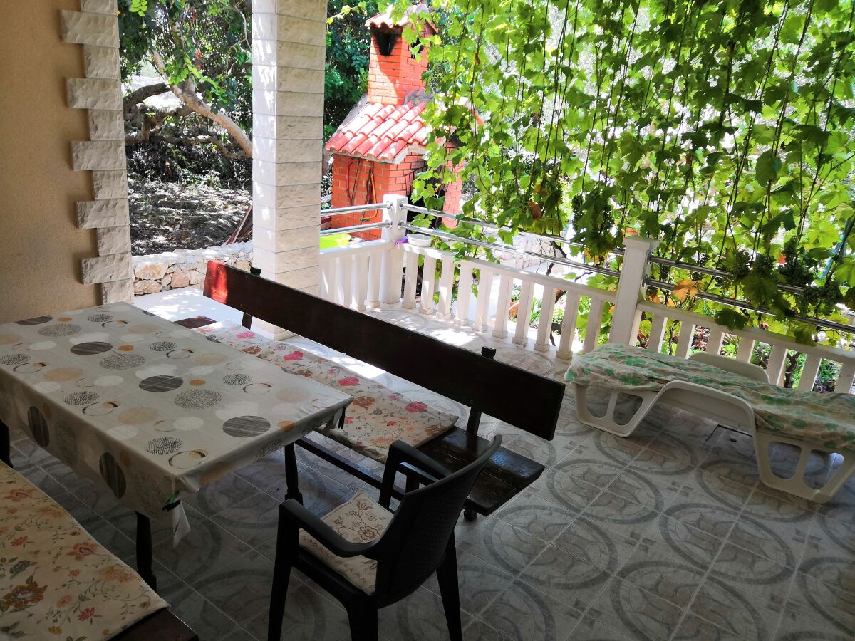 Apartment One bedroom apartment with terrace Drvenik Mali, Drvenik A-16787-d
