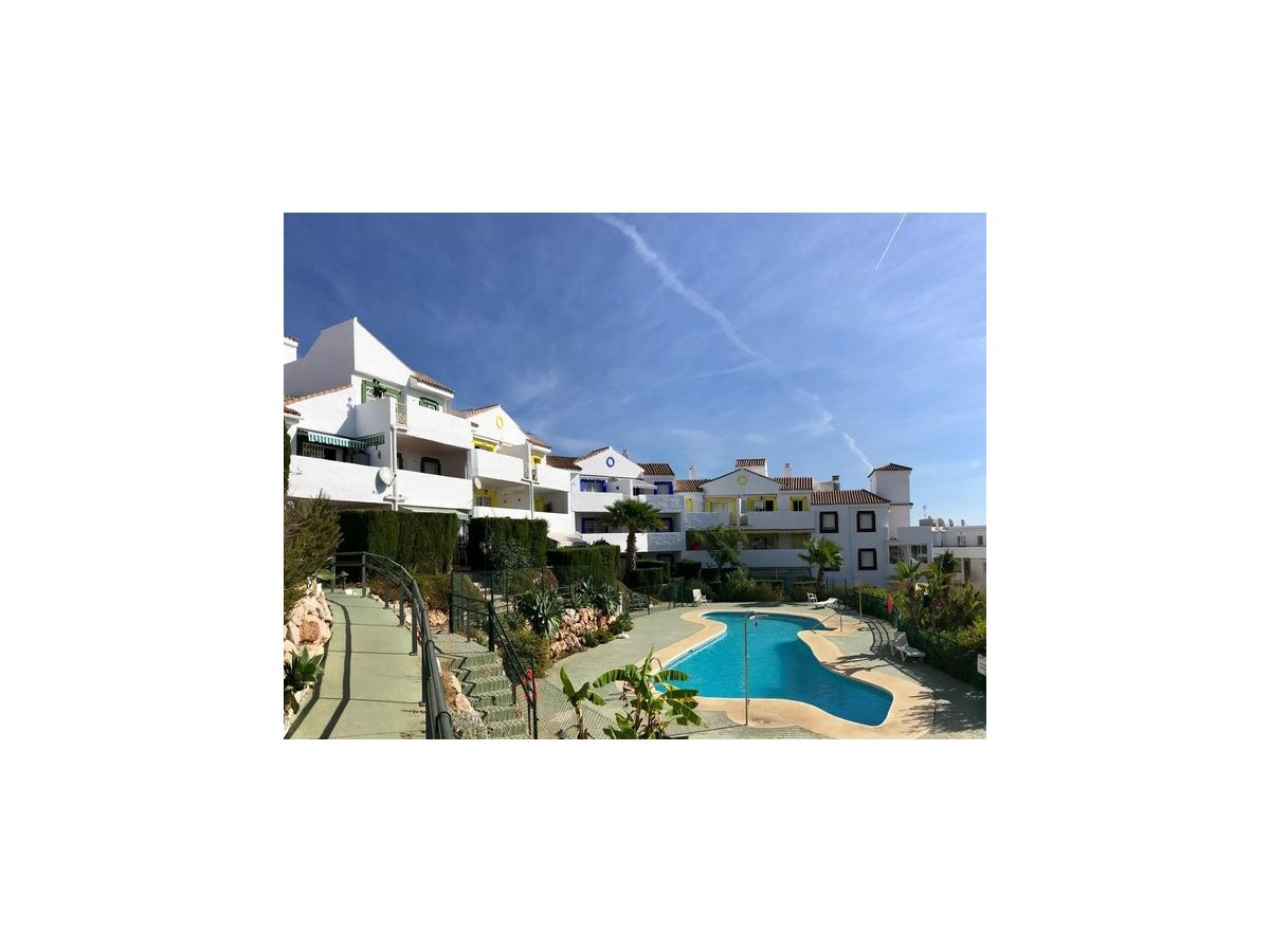 Apartment Apartment with garden and communal pool