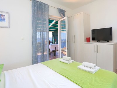 Apartment Two bedroom apartment with terrace and sea view Pisak, Omiš A-16239-b in Pisak - Apartment