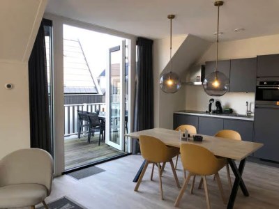 Apartment Lodge with view of the church and dunes - Features photo 16