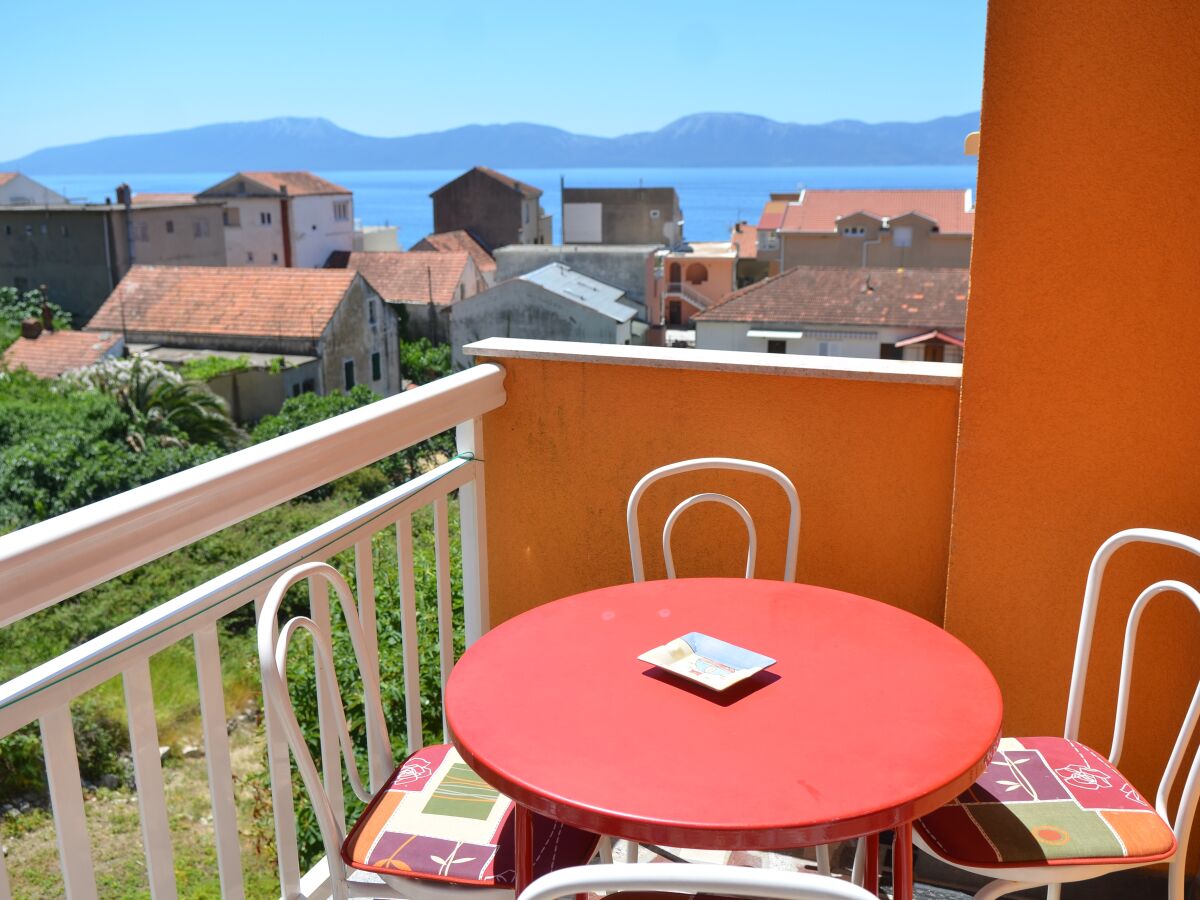 Apartment One bedroom apartment with balcony and sea view Gradac, Makarska A-13681-c