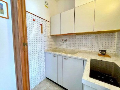 Apartment 5-Person Stay by the Beach - Features photo 7