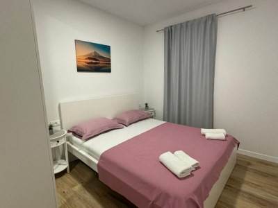 Apartment Apartment & Rooms Papa - Two Bedroom Apartment with Balcony and Partial Sea View - Features photo 9