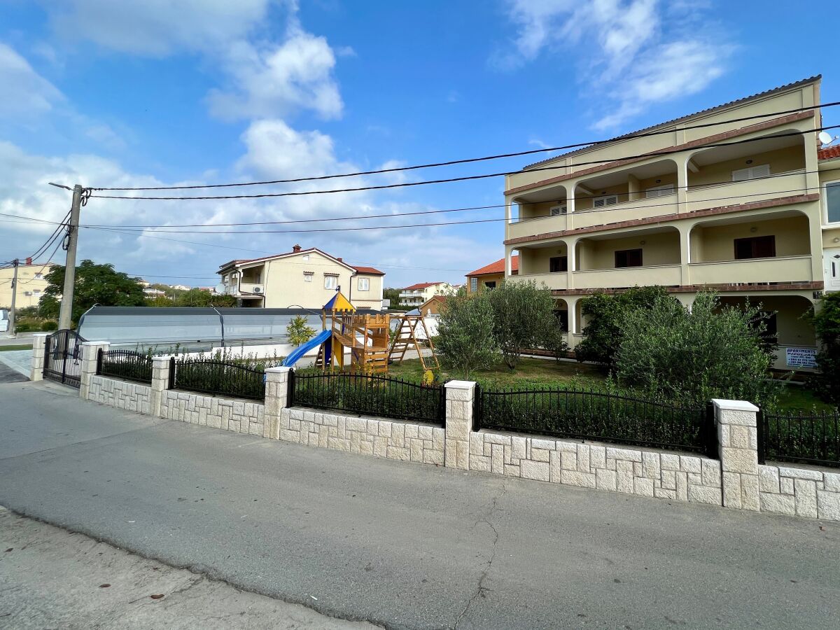 Apartment Three bedroom apartment with terrace Lopar, Rab A-20644-d - Outdoor photo 2