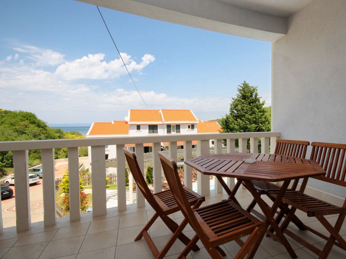 Apartment One bedroom apartment with terrace and sea view Kampor, Rab A-3214-c