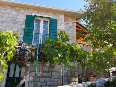 Apartment Three bedroom apartment with terrace Postira, Brač A-14822-a - Outdoor photo 2