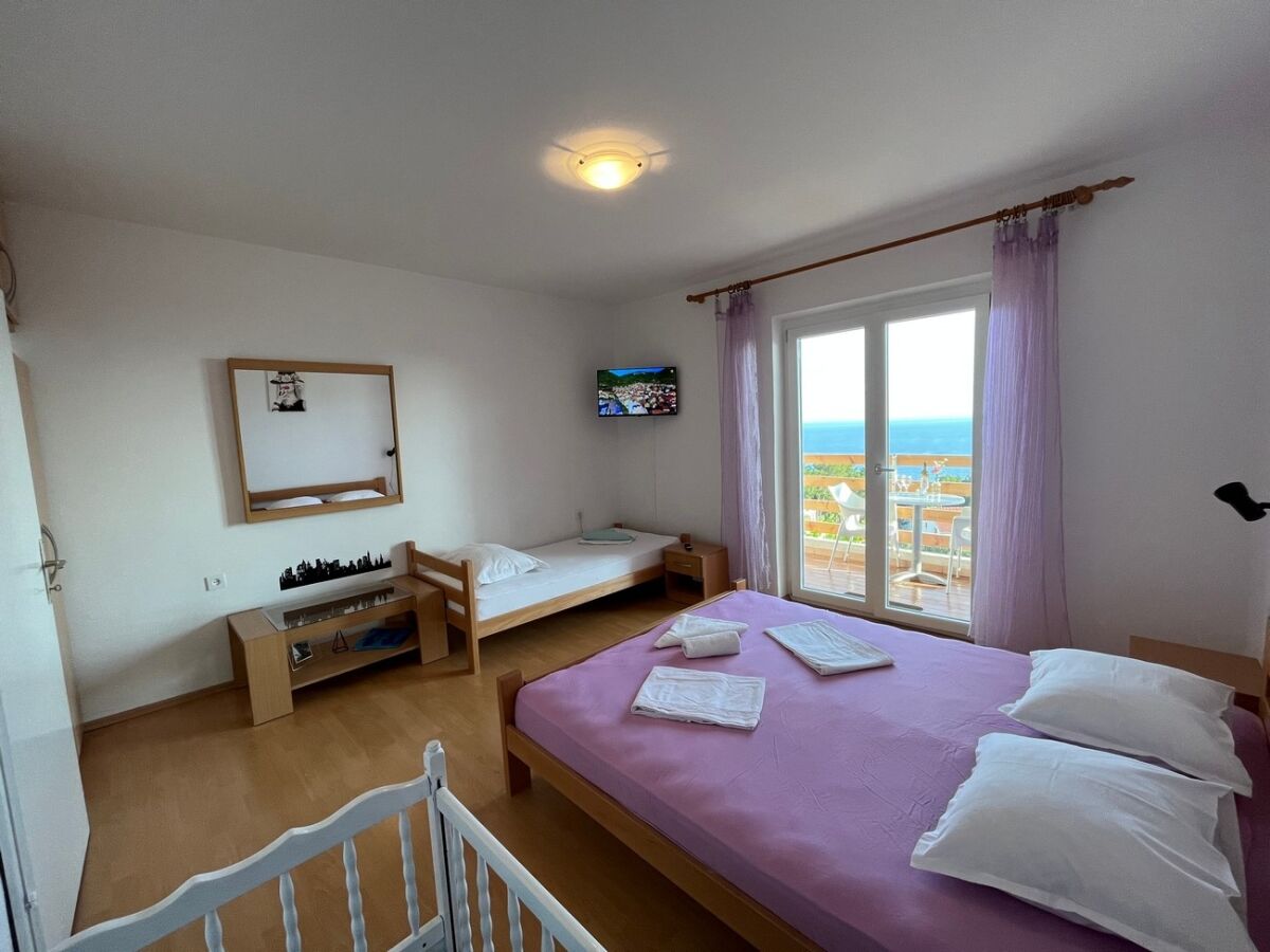 Apartment One bedroom apartment with terrace and sea view Ivan Dolac, Hvar A-22459-c