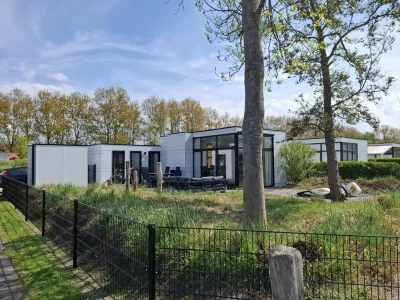 Holiday house Chalet Herzklopfen mit Zaun Hausnr. B092 in Breskens - Holiday house