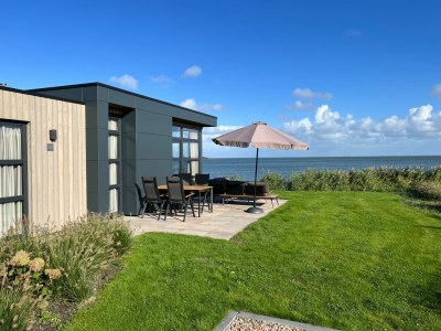 Holiday house Chalet Strandmuschel Erste Reihe mit Zaun Haus Nr. 215 in Enkhuizen - Holiday house