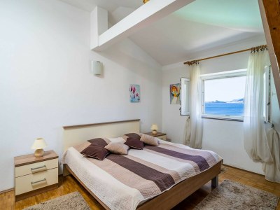 Apartment Apartments & Rooms Mara & Petrunjela - One Bedroom Apartment with Balcony and Sea View - Features photo 9