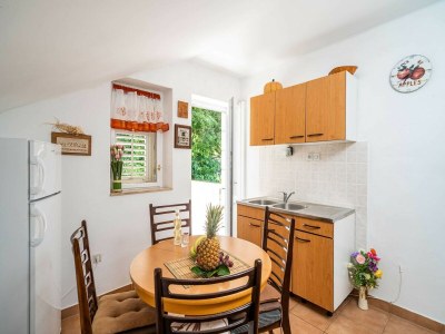 Apartment Apartments & Rooms Mara & Petrunjela - One Bedroom Apartment with Balcony and Sea View - Features photo 17