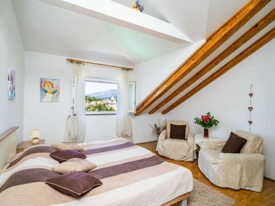 Apartment Apartments & Rooms Mara & Petrunjela - One Bedroom Apartment with Balcony and Sea View - Features photo 18