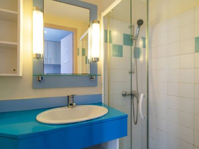 Apartment Ferienwohnung an der Küste mit beheiztem Pool - Features photo 10