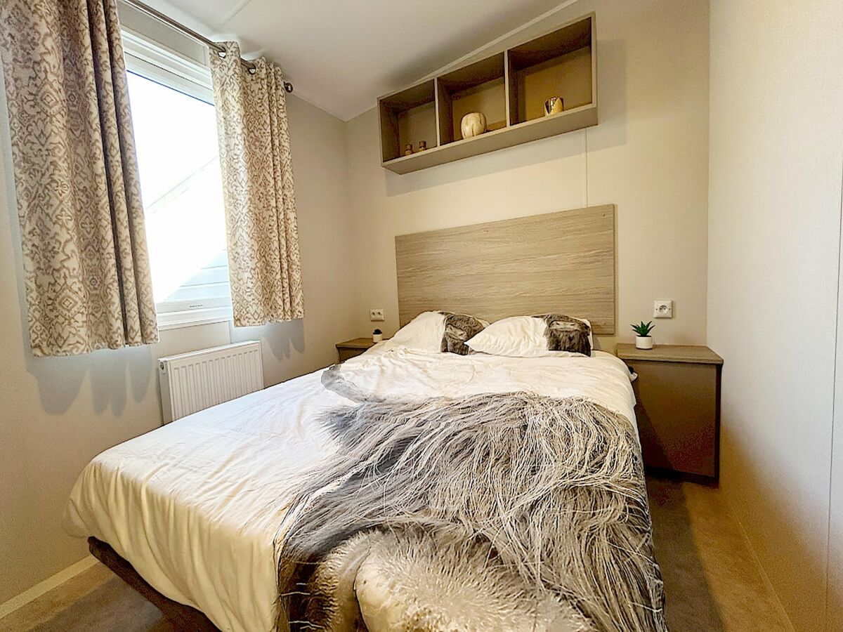 Chalet Inviting Hollum Chalet near Golf Course - Features photo 4