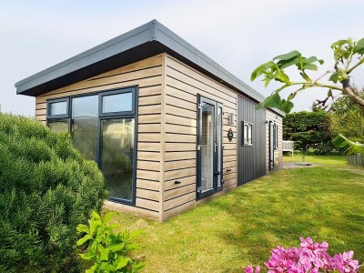 Chalet Inviting Hollum Chalet near Golf Course in Ameland - Chalet