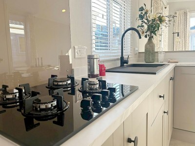 Chalet Inviting Hollum Chalet near Golf Course - Features photo 5